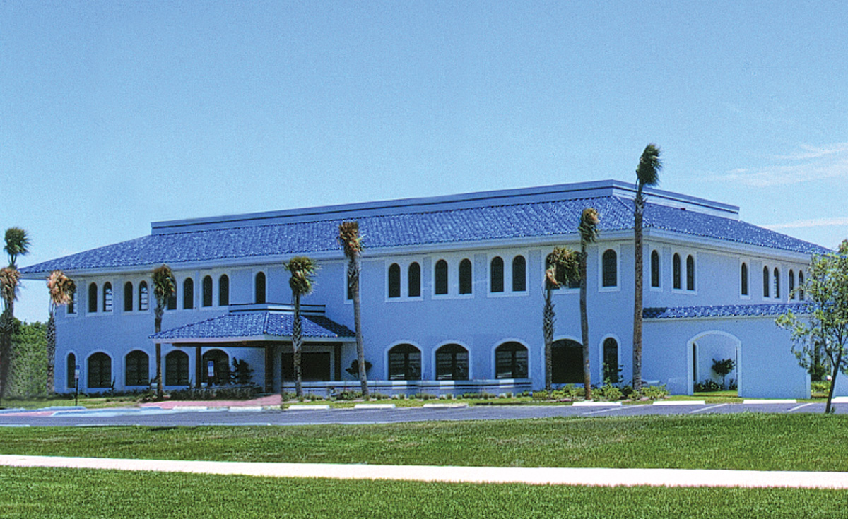 Improved S tile in blue on office building in Florida