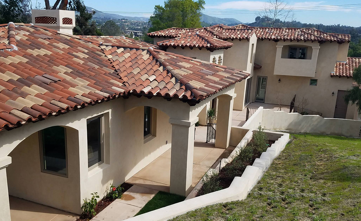 Classic S Mission clay roof tile in 50% B330-R Old Santa Barbara Blend, 20% B334-Rustic Ivory Blend, 20% B318-R Cafe Rustic Blend, and 10% B331-R Zorro Blend on home in Encinitas, CA