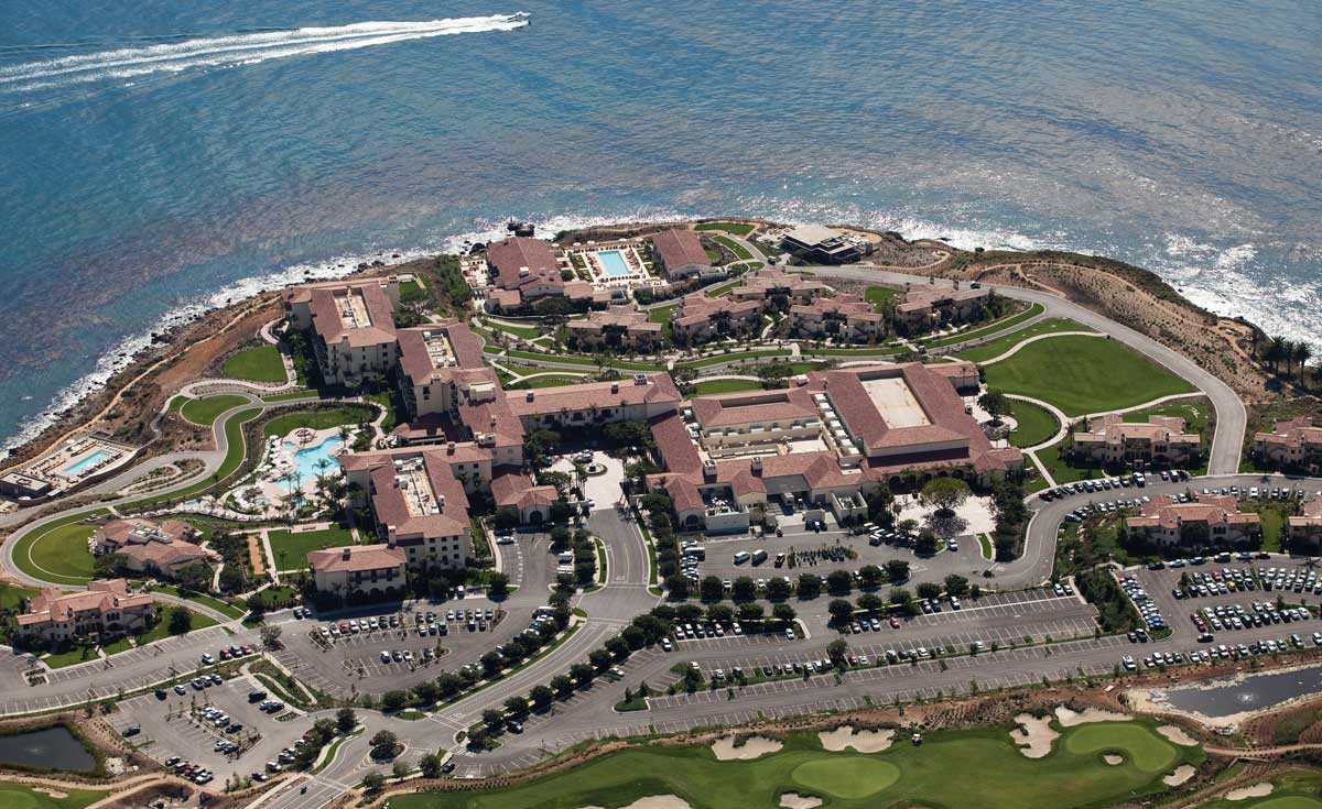 aerial view of one piece s mission clay roof tile in various custom blend with two piece eave application on Terranea Resort in Rancho Palos Verdes, California