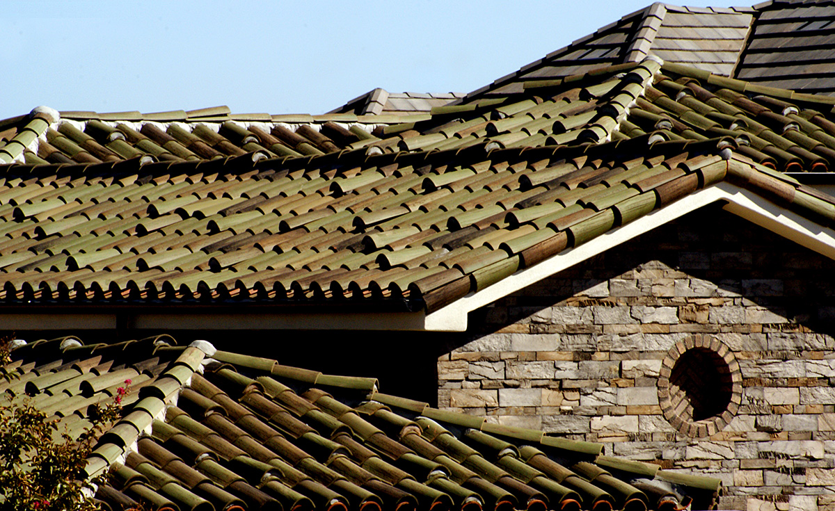 Detail of Classic S mission clay roof tile in CB388-R vintage green blend on home in San Diego, CA.