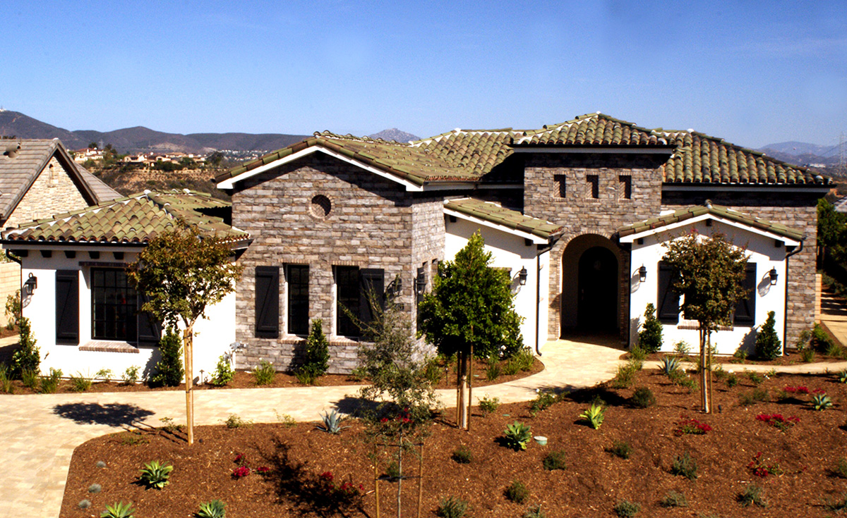 Classic S mission clay roof tile in CB388-R Vintage Green Blend on home in San Diego, CA.