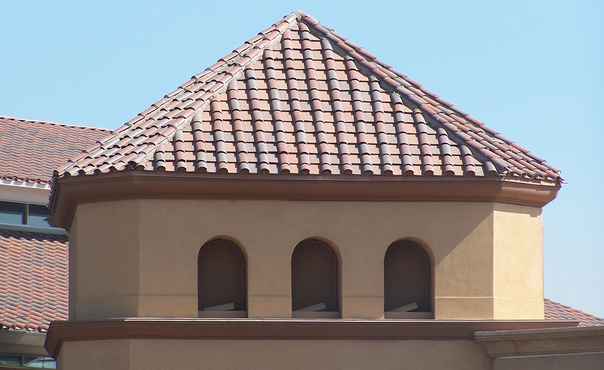 detail of roman pan clay roof tile in 60% F40 natural red, 30% 2F28 carbon and 10% 2F43 Brick Red on Westfield Valencia Town Center, Valencia, CA