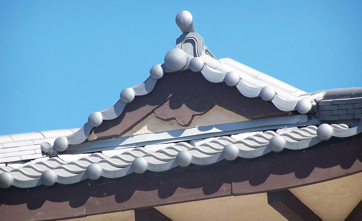 detail of oriental Japanese clay roof tile in C09 Japanese black ibushi on restaurant in Long Beach california