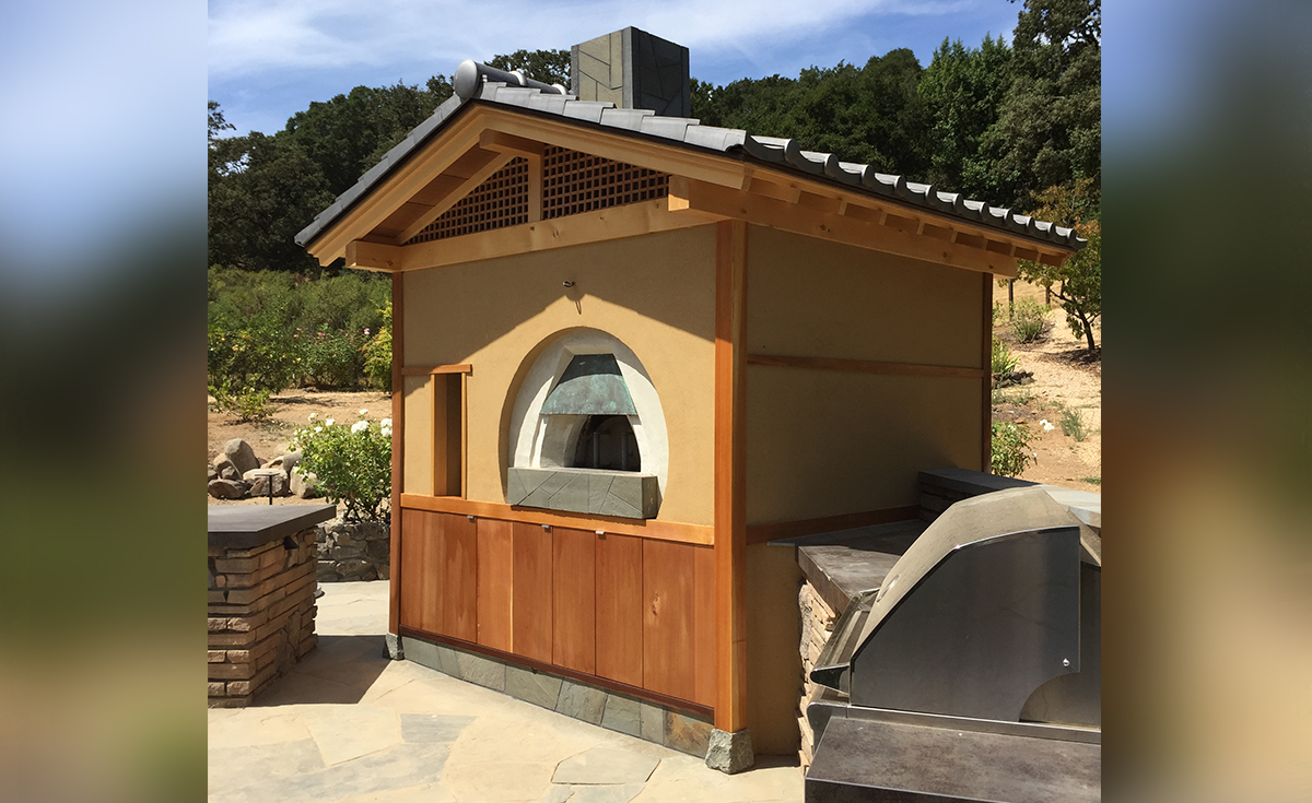Oriental-Japanese clay roof tile in C09 Japanese Black on a backyard pizza oven in Northern California
