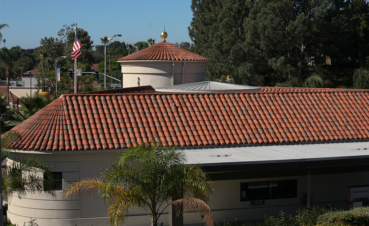 Corona Tapered Mission clay roof tile and Turret Tile in custom blend on IronStone Bank in Solana Beach, CA