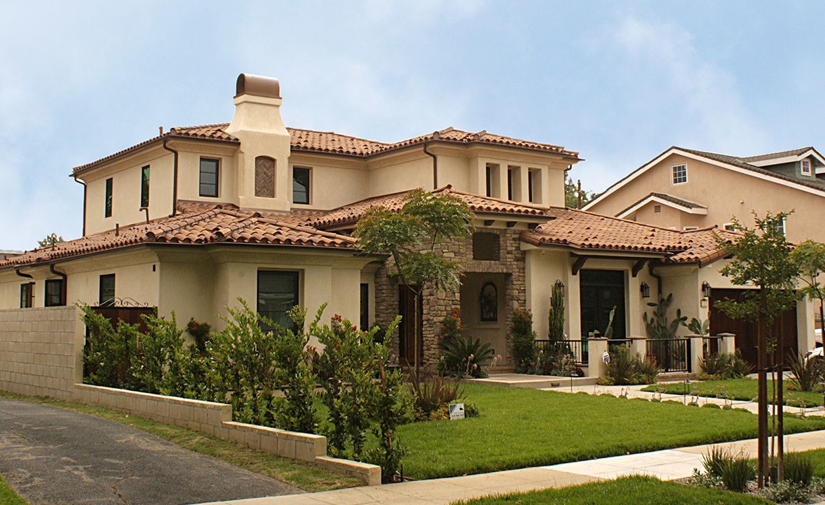 Classic S Mission clay roof tile with Two Piece Eave Application in CB4645D-SC Rustic Tuscan Dark on home in Burbank, CA