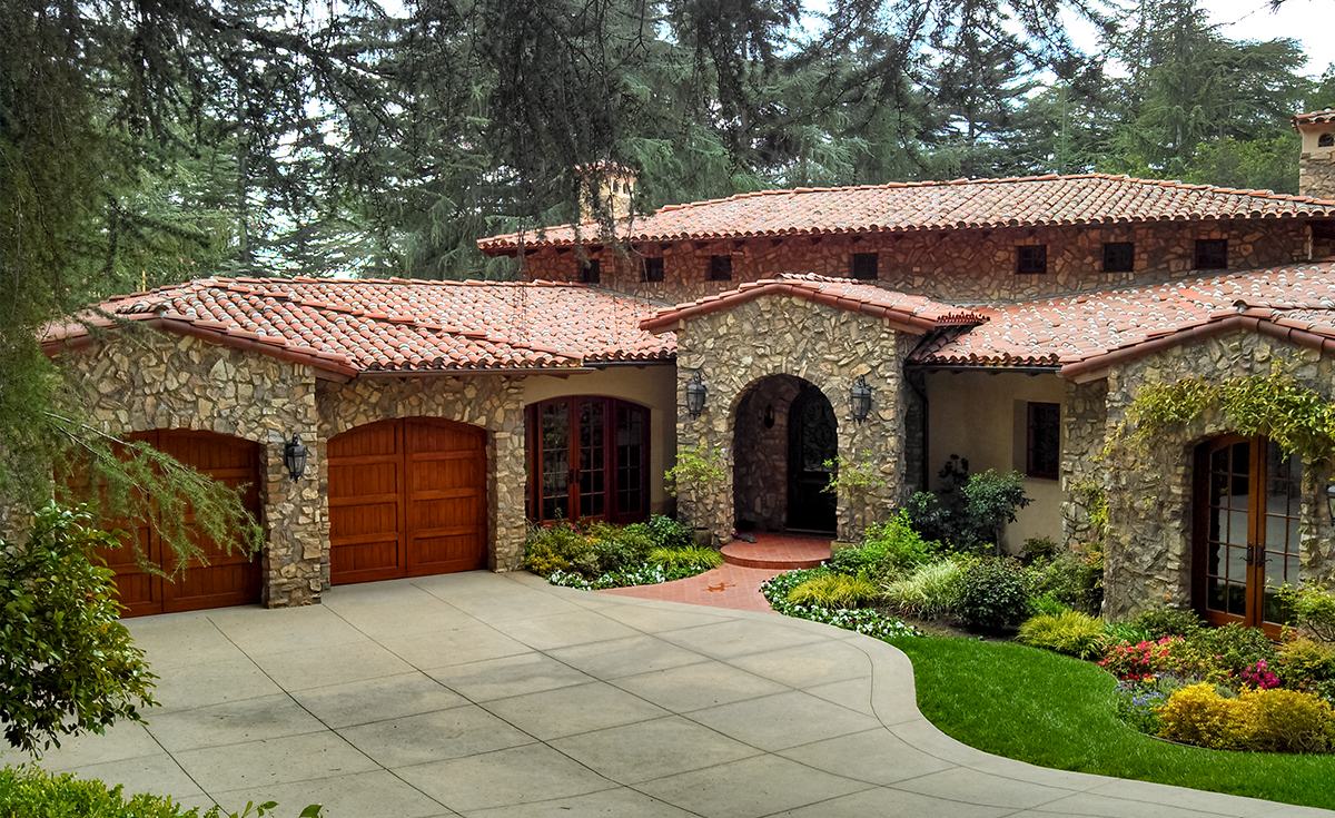 classic tapered mission clay roof two piece tile in 67% F72 Mahogany and 33% F45 tobacco with weepy mortar and field boosting on custom home in La Cañada Flintridge California