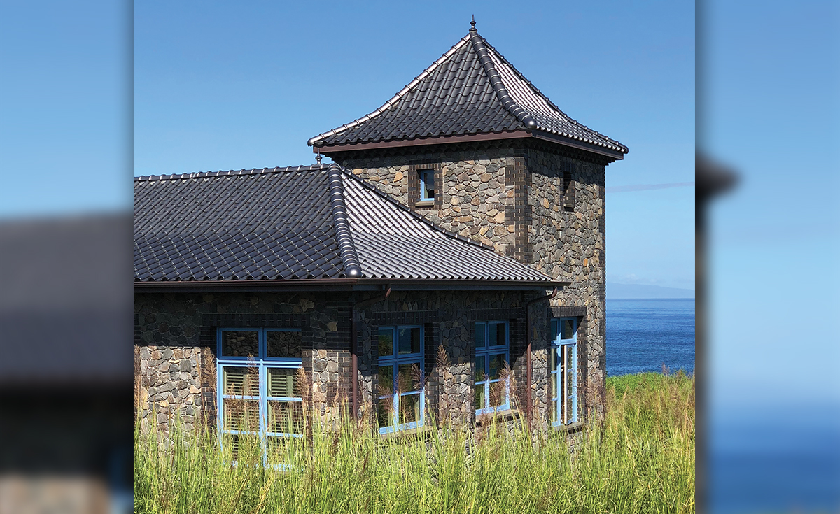 French Chateau inspired home with Improved S clay roof tile with genoise eave in C23 Metallic Silver Clay Roof Tile in Maui, HI