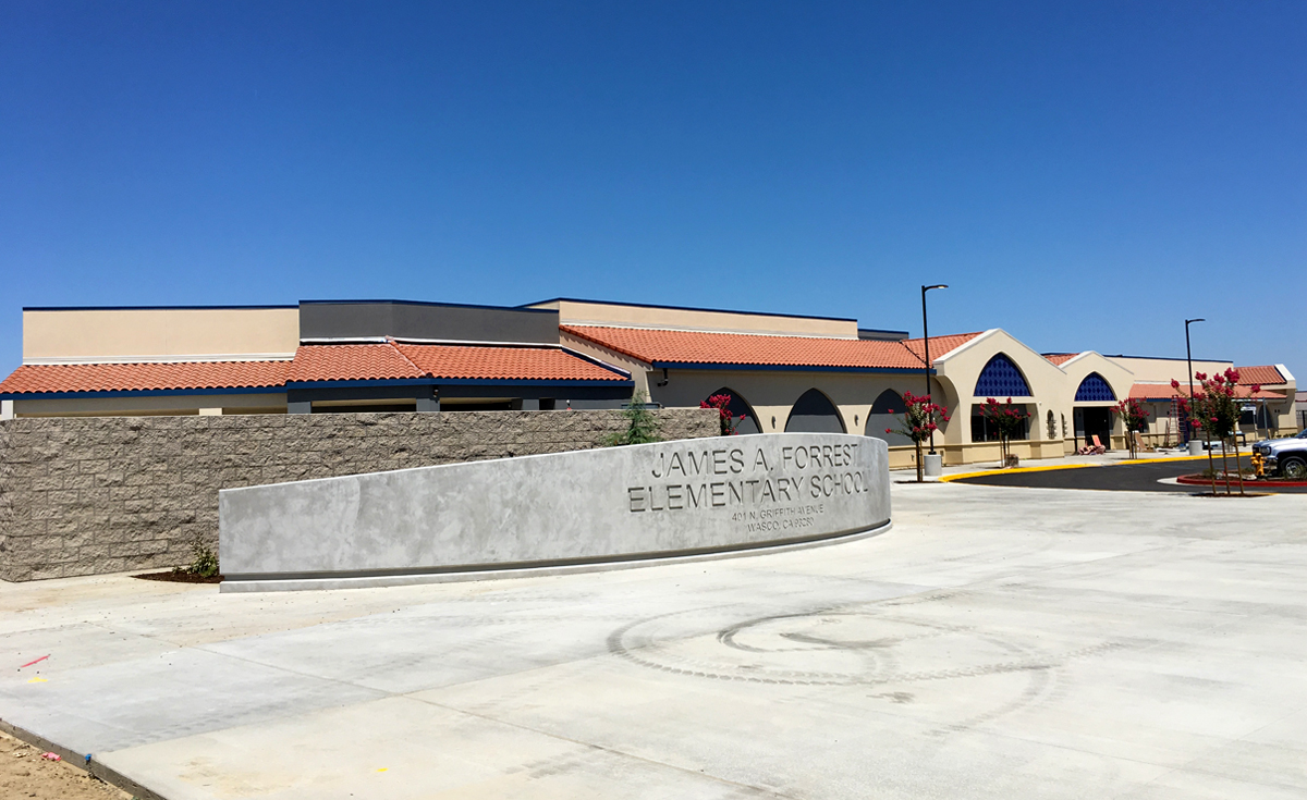 Front view of James A. Forrest Elementary School Wasco California with One Piece S Mission clay roof tile in F40 Natural Red color