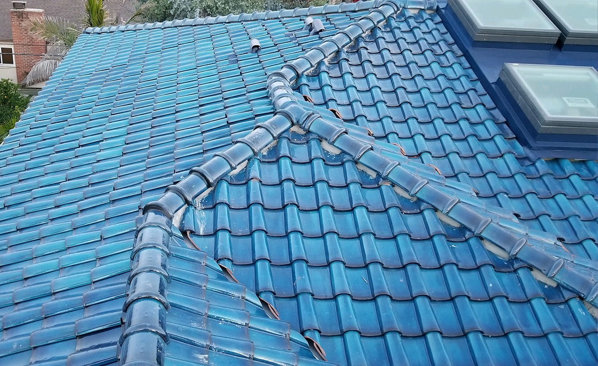 Roof detail of Improved S terra-cotta clay roof tile glazed in C01 Blue on Culver City home, California